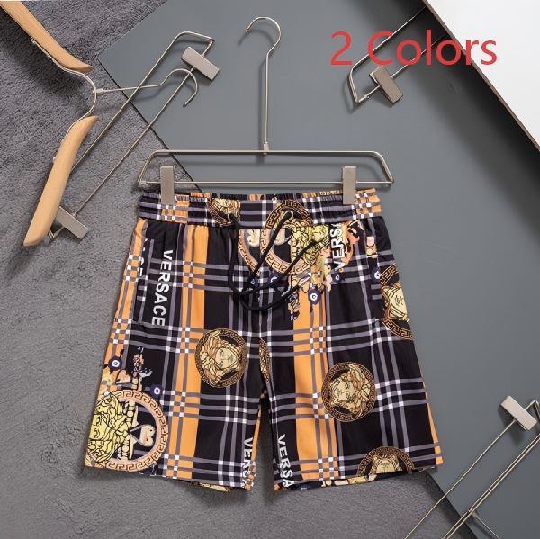 Versace Men’s Orange and Black Plaid Medusa Head Shorts AO70097006